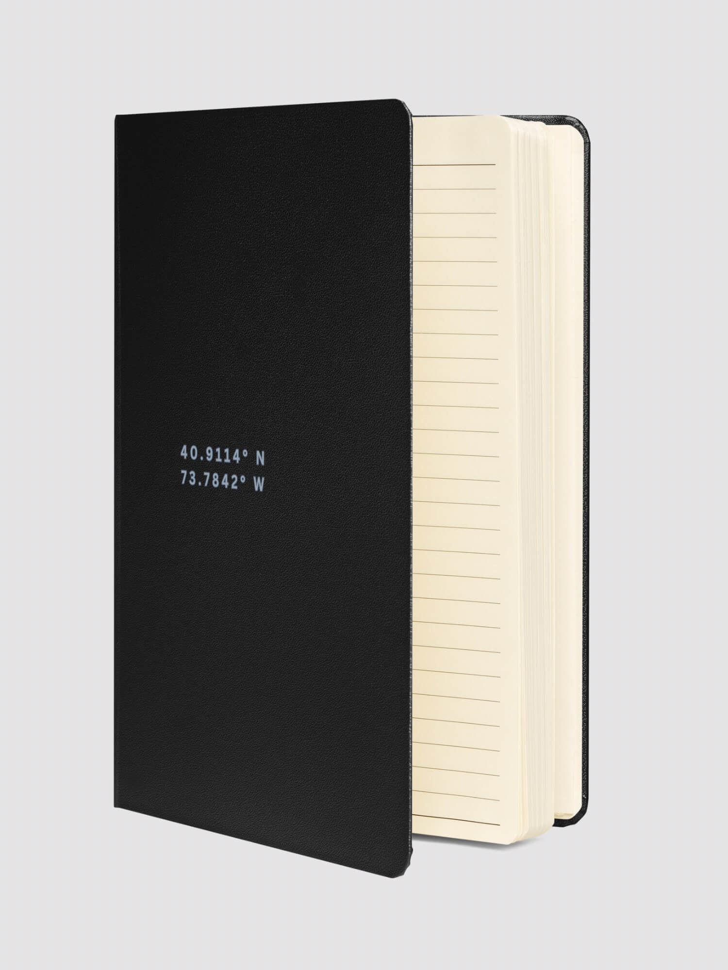 Hardback Notebook ny  Shop LATITUDE° American GPS 80 pages of lined, cream-colored paper, matching elastic closure, ribbon marker and expandable inner pocket Office stationary hardcover Notebooks supplies 5.5"×8.5" global positioning longitude and latitude map positioning numbers reference positions pattern for New Rochelle station, NY New York, USA Journals in Black United States of America design