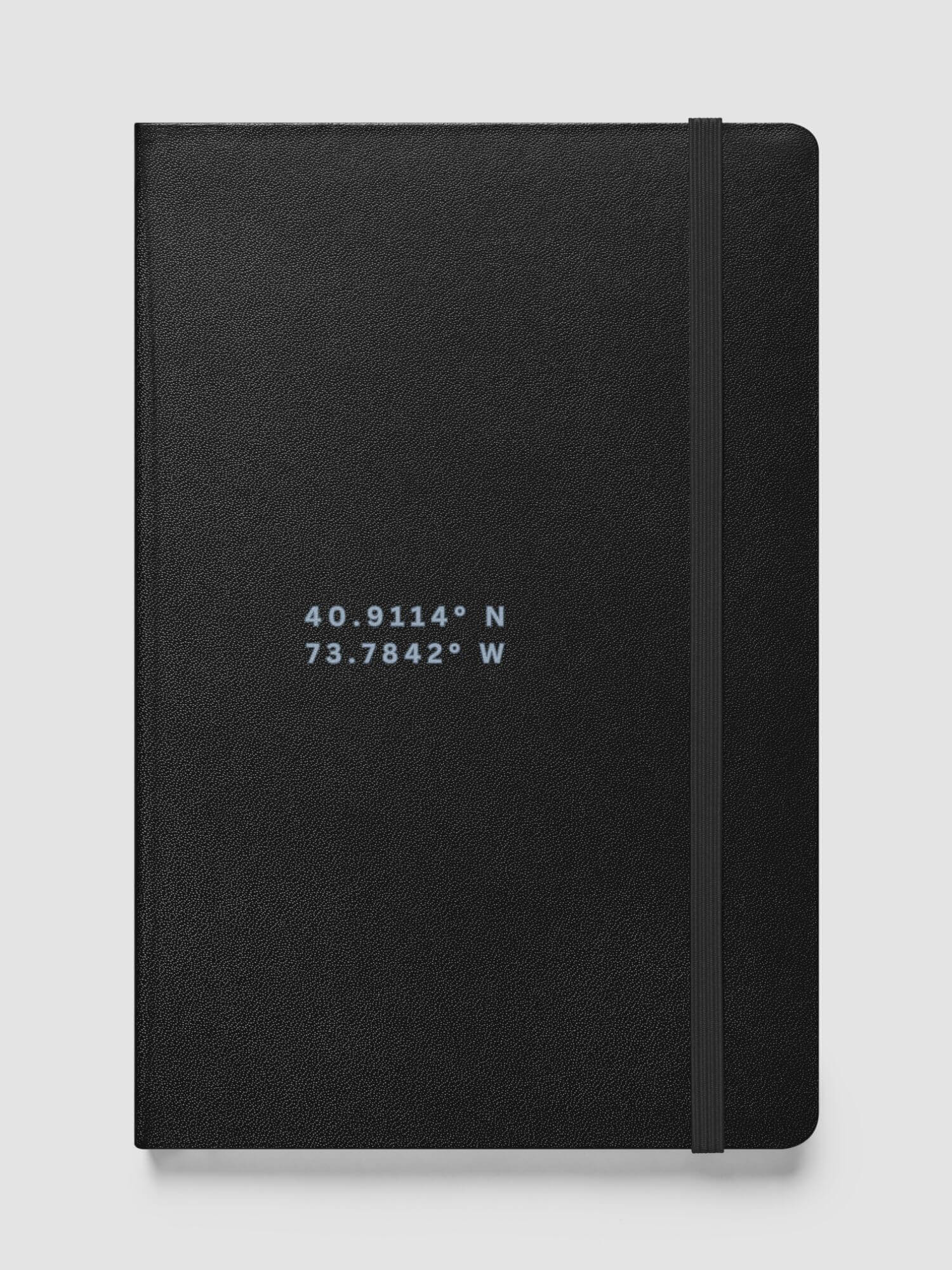 Hardback Notebook ny  Shop LATITUDE° American GPS 80 pages of lined, cream-colored paper, matching elastic closure, ribbon marker and expandable inner pocket Office stationary hardcover Notebooks supplies 5.5"×8.5" global positioning longitude and latitude map positioning numbers reference positions pattern for New Rochelle station, NY New York, USA Journals in Black United States of America design