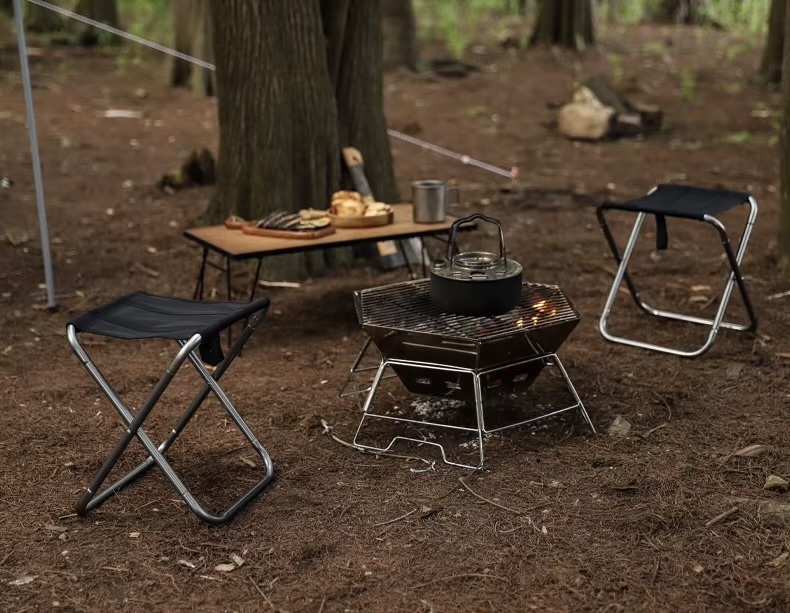 Outdoors Camping Portable Stainless Steel Folding BBQ Barbecue Grill for Outdoor Camping, Self-Driving Campsite Fire Pit & Campfire Stove in silver with carry bag