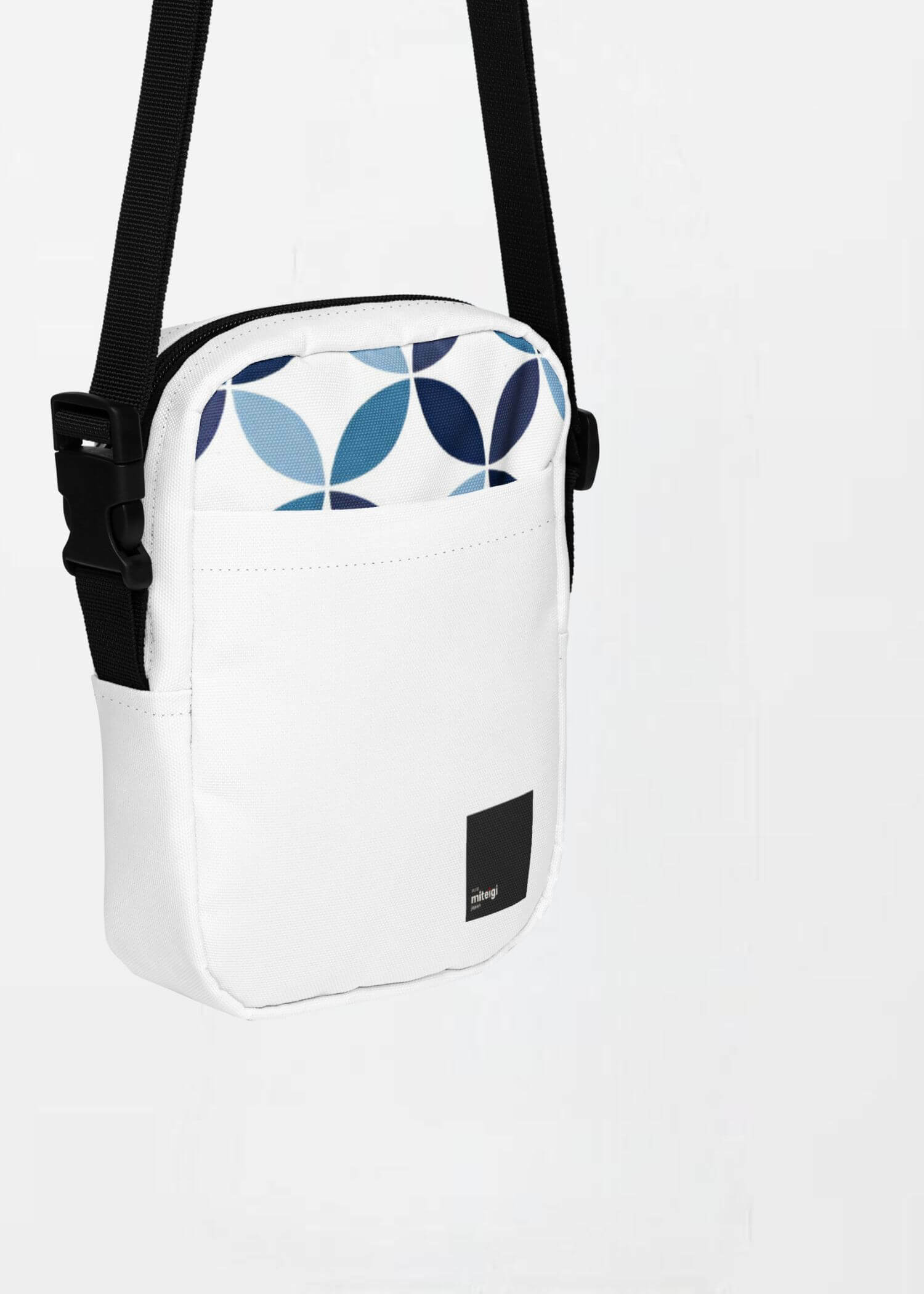 Utility Crossbody Bag miteigi Logo indigo   Unisex Men’s Women’s everyday use Japanese shoulder bags Luggage for man woman in white with black design and blue patchwork circles pattern highlights womens mens accessory