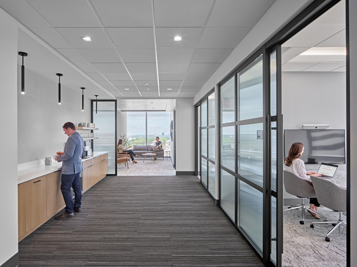 Private offices and shared refreshment area in the completed financial services headquarters