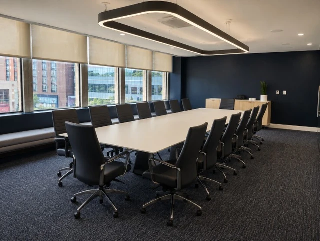 Modern conference room designed and furnished by Warehouse of Fixtures