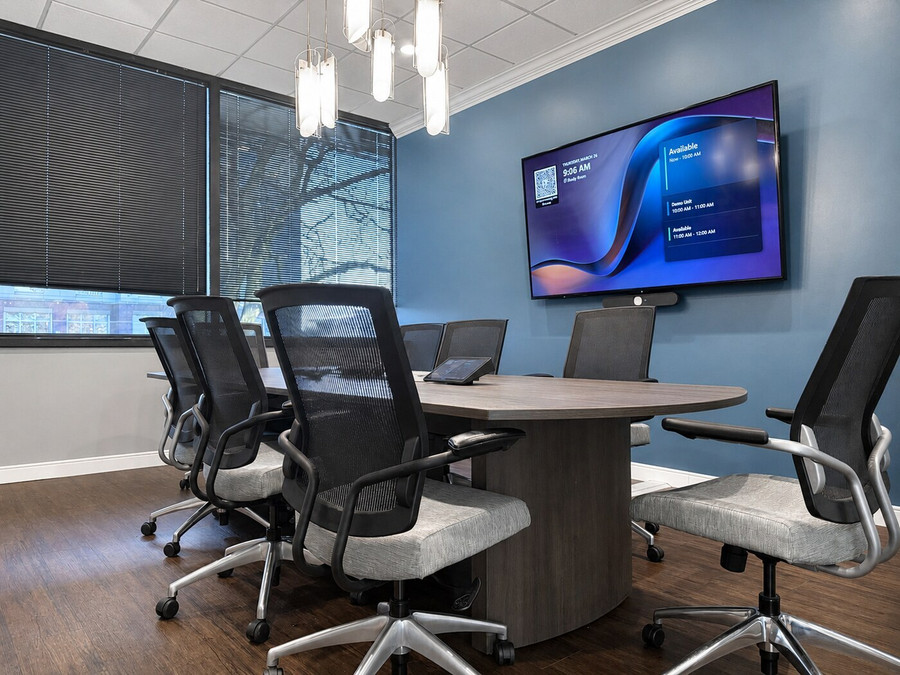Conference room with commercial office furniture at Crane Agency headquarters