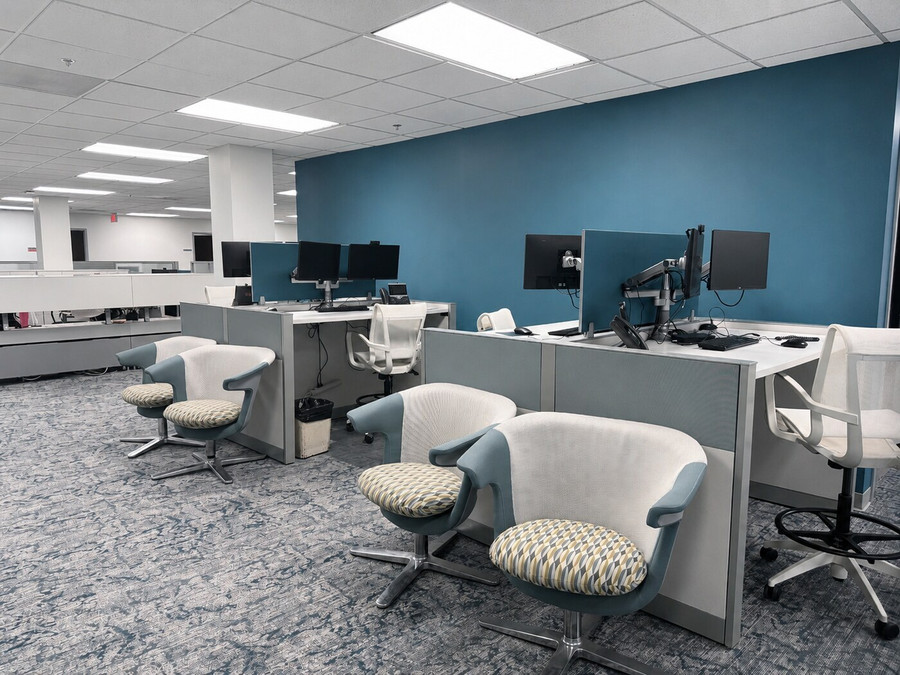 Employee workstations and collaborative seating at Crane Agency headquarters