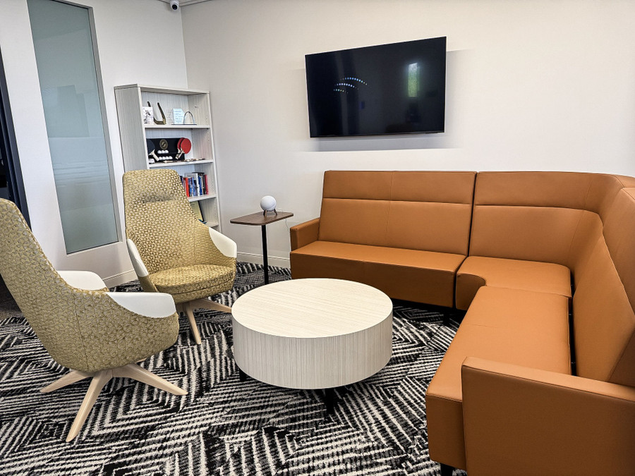Gateway Fiber lounge with collaborative seating in warm modern finishes