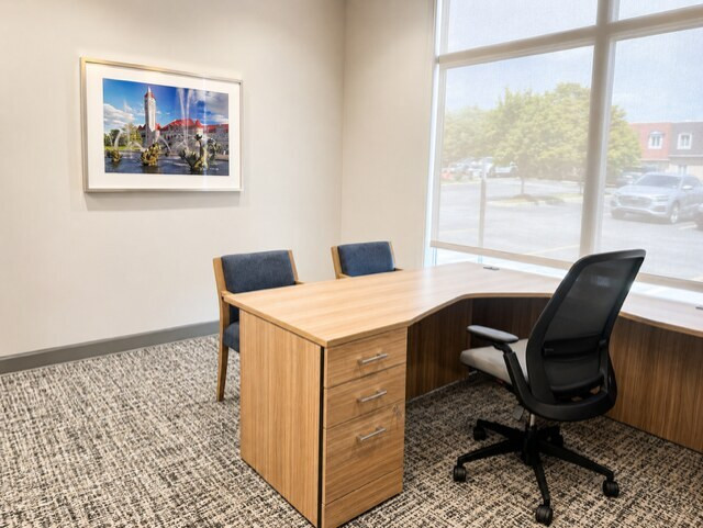 Private office at Midwest BankCentre Frontenac with desk storage and guest seating