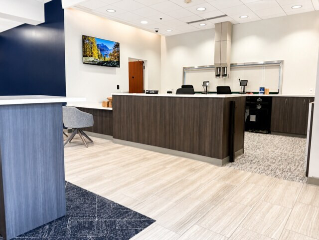 Midwest BankCentre Frontenac teller stations with coordinated finishes