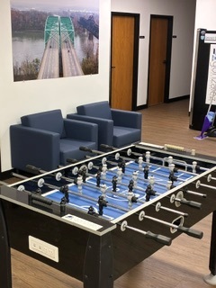 Pre-owned foosball table in the Gonzalez Companies bar and gaming area