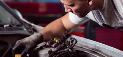Mechanic working on a car