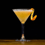 A Marmalade Martini with an orange garnish.