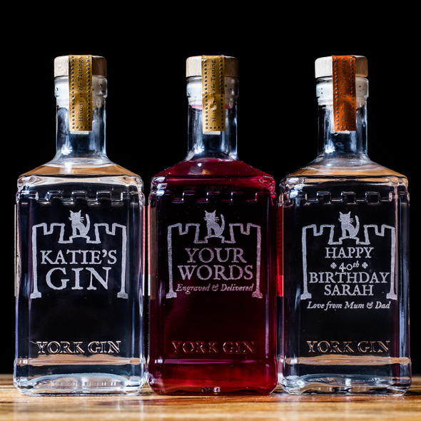 Three York Gin engraved personalised bottles.
