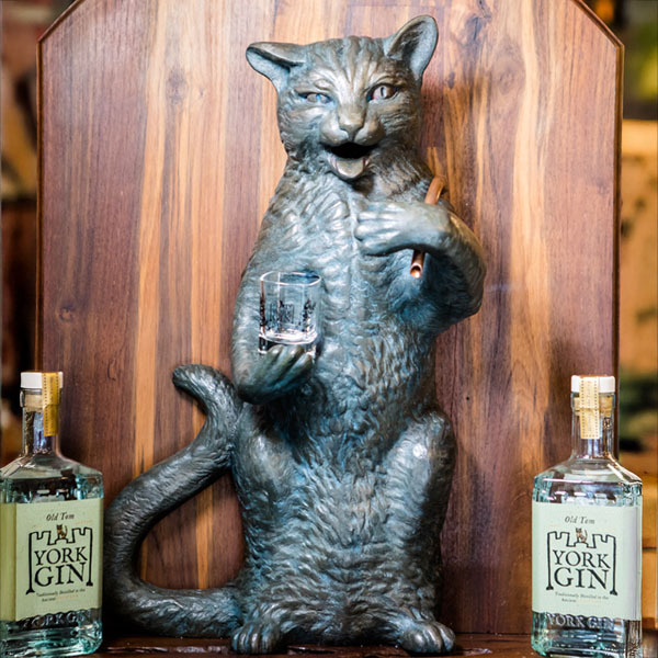 Approaching the Puss and Mew sculpture at York Distillery