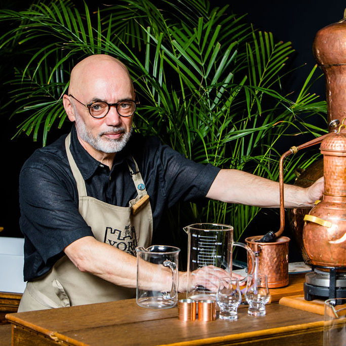 Gin tutor Tim with the copper still at York Distillery, a home of York Gin
