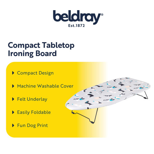 Compact tabletop ironing board with foldable legs and fun dog print cover.