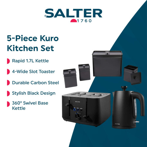 Black electric kettle on kitchen counter with glass cup and tea bags