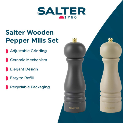 Set of black and cream wooden pepper mills with gold knobs, Salter brand.