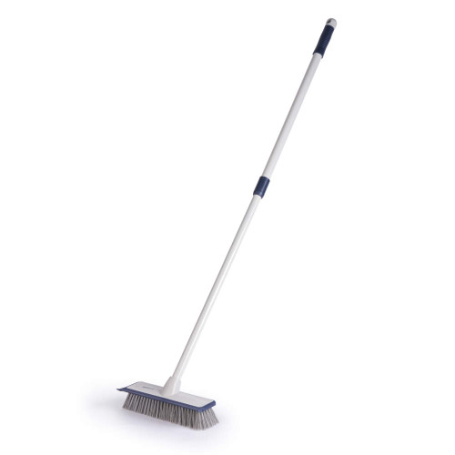 Long-handled blue and white scrubbing brush with stiff bristles, shown upright