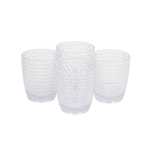 Set of four clear textured drinking tumblers on white background