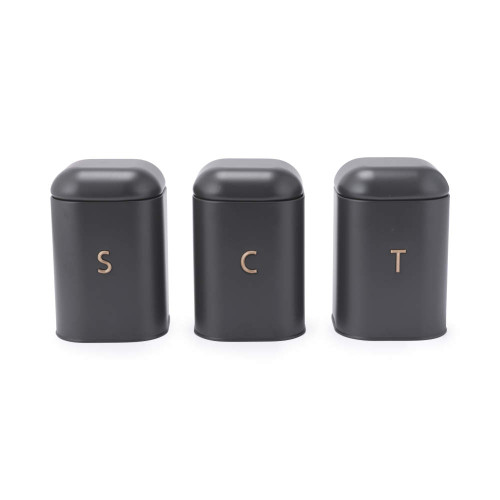 Set of three matte black storage tins labelled S, C, and T for tea, coffee, and sugar.