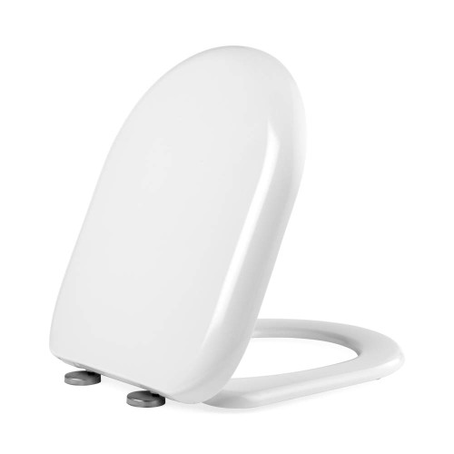 White toilet seat with lid closed, viewed from an angle on white background
