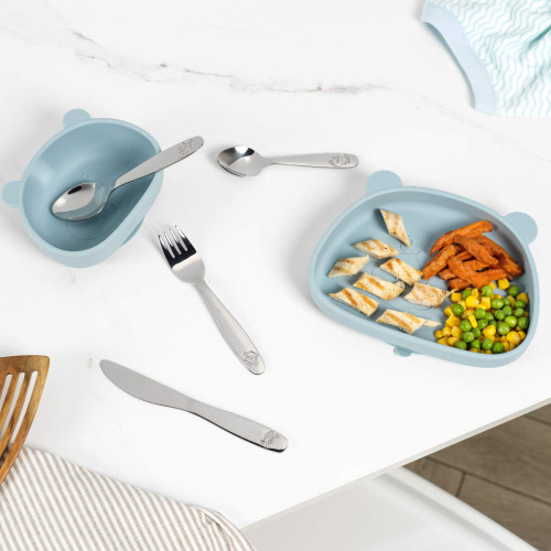 Children’s dinosaur theme 12-piece cutlery set in yellow Salter box, showing fork, knife and spoons