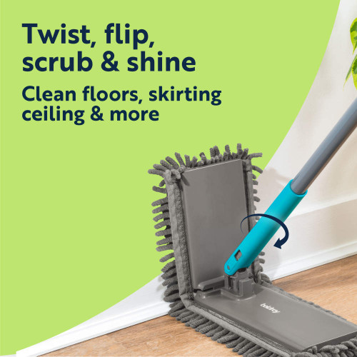 Grey flat mop with rotating head cleaning floor and skirting board, shown with usage text.
