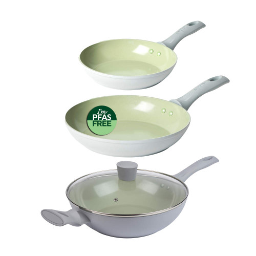 Set of three light green PFAS free frying pans, one with glass lid.