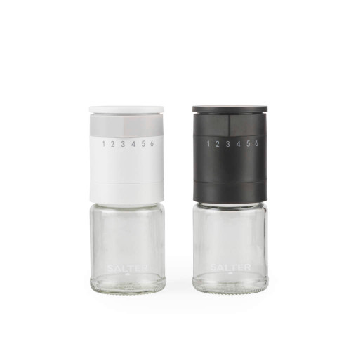 Set of two Salter spice grinders in black and white, with numbered adjustable tops.