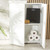Black digital bathroom scale, underside view showing four round feet and battery compartment