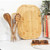 Close-up of brown bamboo chopping board with raised pyramid texture