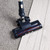 Vacuum cleaner head transitioning from carpet to wood floor