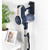 Blue and silver cordless stick vacuum cleaner mounted on wall, shown in home setting