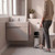 Silver pedal bathroom bin beside toilet in modern bathroom