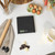 Boxed Salter Arc Electronic Kitchen Scale, black, with bowl of berries on front
