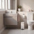Modern white bathroom with wall-mounted cabinet, toilet and small bin