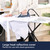 Person ironing on large heat reflective ironing board cover, suitable for steam generators