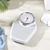 White mechanical bathroom scale with large easy-read dial, shown on tiled floor