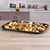 Tray of assorted roasted vegetables on kitchen counter