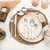Eight-piece stainless steel cutlery set with knife, forks and spoons, displayed side by side