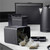 Black microwave oven with digital controls on kitchen worktop