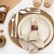 Four-piece stainless steel cutlery set with size measurements shown
