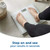 Person standing on white digital bathroom scales showing 60.0kg