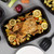 Black enamel roasting tray with text: Easy clean vitreous enamel coating.