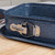 Russell Hobbs logo embossed on grey, speckled non-stick cookware surface