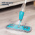 Spray mop in use on wood floor, showing 450 ml spray capacity feature.