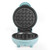 Open mint green mini waffle maker shown from front, empty and ready to use