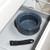 Set of blue speckled nesting saucepans and detachable handle in kitchen drawer