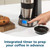 Coffee maker with travel mug and timer display set for advance brewing