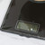 Digital kitchen scale with glass surface showing close-up of display and buttons