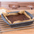 Tray of baked chocolate brownies on cooling rack, with ingredients beside.